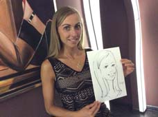 шаржисту позирует Вера на корпоративе в ресторане Бобо Минск Калининград