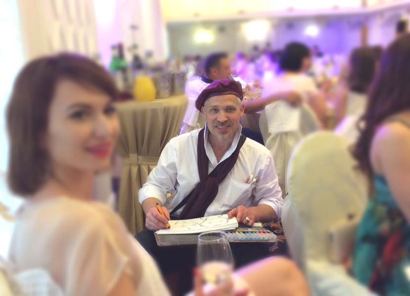 шаржист рисует на свадьбе в Резиденции Королей